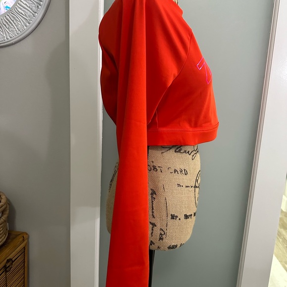 NWT Zumba Long Sleeve Crop Top with open back. Cherry Red with Pink Zumba logo. - Picture 4 of 7